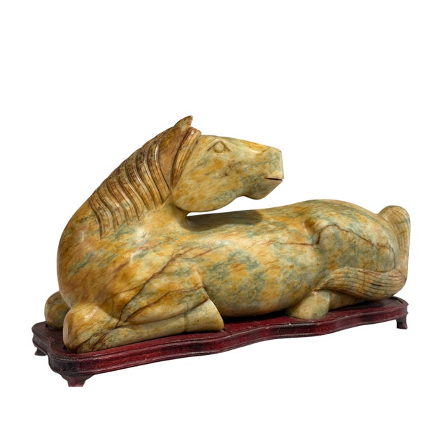 This exquisite jade horse embodies the refined artistry of the Republic Period, carved from a single stone with remarkable...