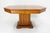 A solid oak dining table dating from the 1940s, this piece stands out for its understated elegance and authentic...