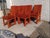 Set of 8 Burnt orange Parsons style dining chairs. The chairs have a velour type fabric. They are fully upholstered. The...