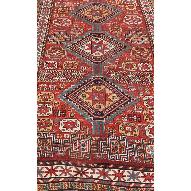 Late 19th Century Antique Qashqai Rug With Geometric Motifs in Red, Blue, and Golden Yellow For Sale - Image 5 of 13