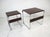A set of two chromed framed side tables with very well grained Brazilian rosewood tops and stretchers. Manufactured in the...