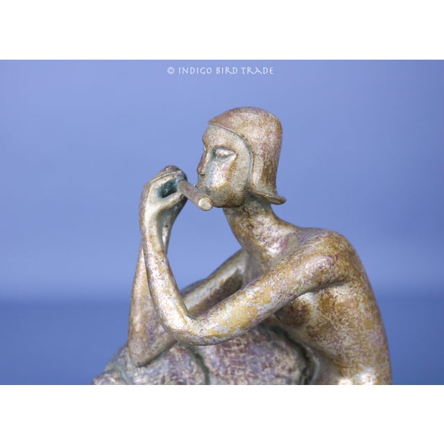 Vintage Abstract Woman Playing the Flute Sculpture Mid Century Modern This adorable sculpture is made from metal with all...