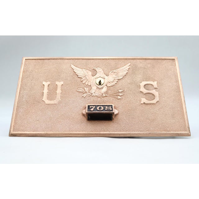 Antique cast bronze post office box door with the box number 708. No key included. It was made by Yale & Towne Lock...