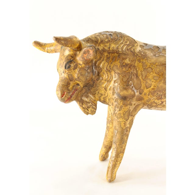 An outstanding figural pottery coin bank All crafted by hand earthenware standing bull Beige tan color, covered with light...