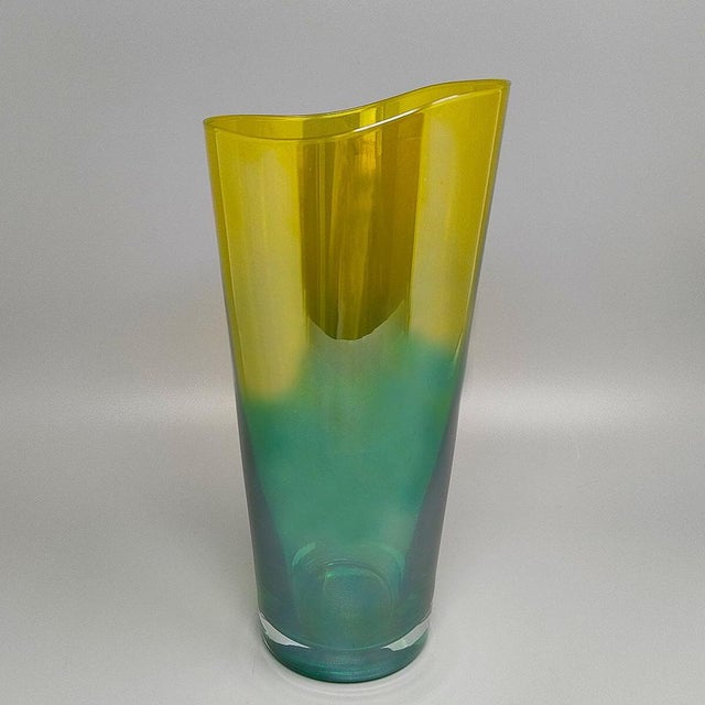 1970s Murano glass vase handcrafted in Italy by the prestigious glassworks Cà dei Vetrai. This striking vintage piece...