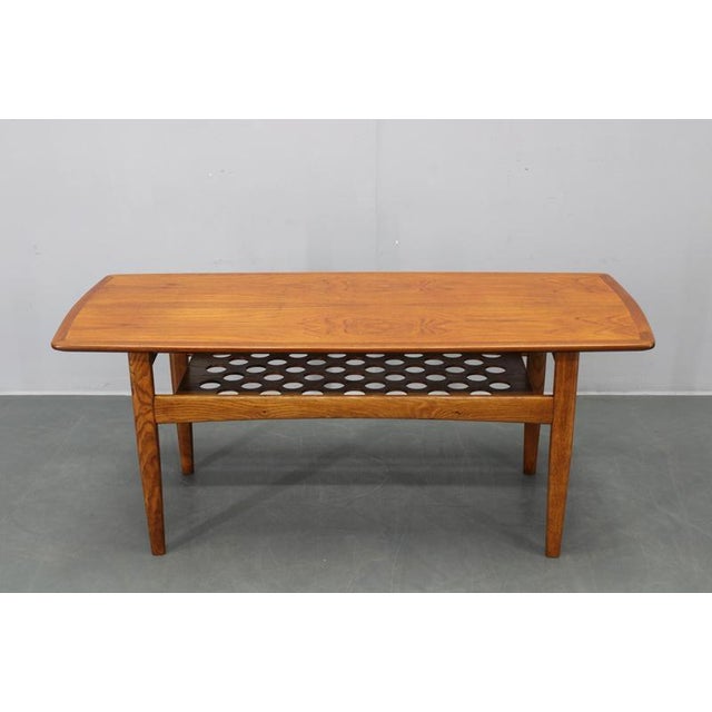 This danish midcentury coffee table dates from the 1960s and exemplifies the understated elegance and functionality...