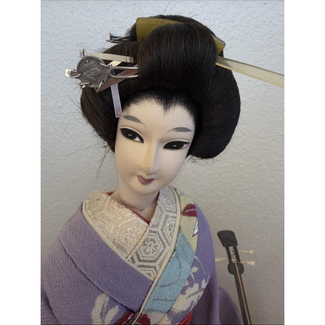Offered is a vintage Japanese souvenir doll manufactured by Nishi, a well-known post-WWII exporter of dolls and...