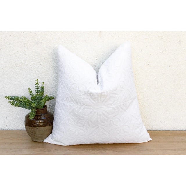 This decorative pillow cover is a beautiful tapestry of history and refined artistry. It features an exquisite array of...