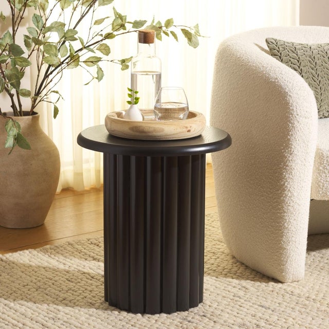 Introducing the Monka End Table, a stylish and sturdy addition to any living space. Crafted from durable wood, its sleek...