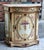 This charming French-style wooden cabinet features a soft, romantic color palette with beautifully hand-painted floral...