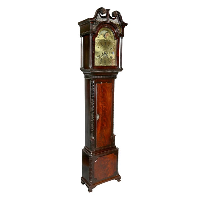 William Taylor lived 1738 till 1801. Beautiful case with unusual fret carved sides of case. The carved broken arched...