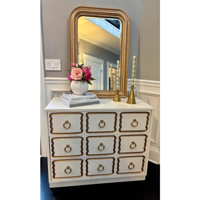 Offered is a vintage chest of drawers in the iconic style of Dorothy Draper Espana. This solid wood piece features three...