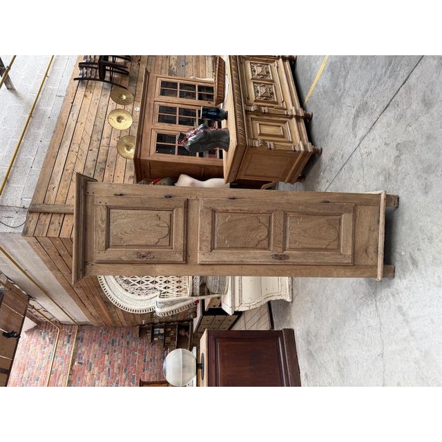 This small château oak cabinet has been fully restored. It features two doors that lock with a key, opening onto interior...