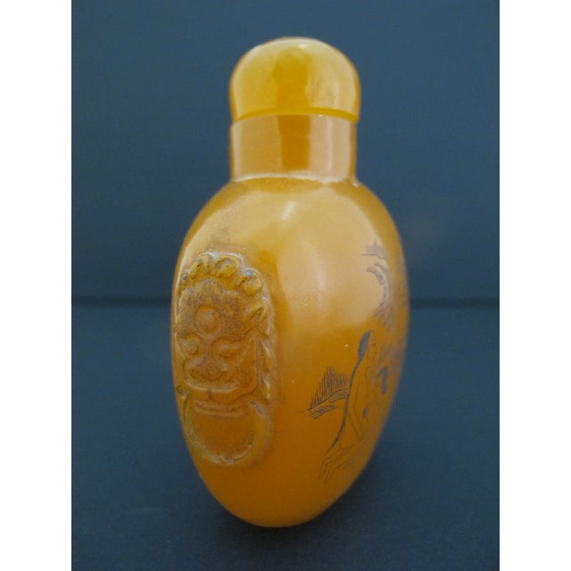 Plastic Chinese Erotic Orange Engraved Mock Mask Ring Handle Snuff Bottle For Sale - Image 7 of 11