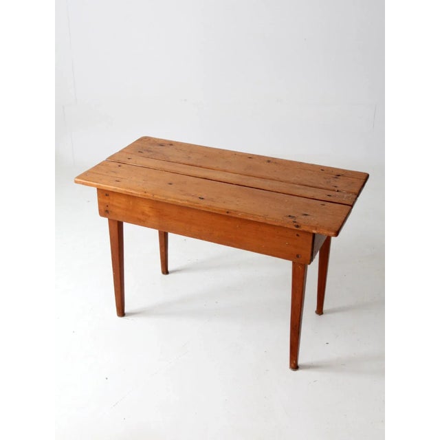 This is an antique primitive table. The slat wood top farmhouse table would make an excellent console or side table or as...