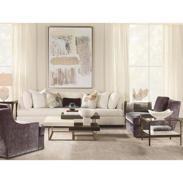 This piece is available only as shown, and will ship in 2-3 weeks. The Emerge Zinc Lamp Table is a sculptured eight sided...