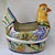 Vibrantly hand-painted large Mexican Talavera chicken planter with intricate rich botanical patterns throughout. I love...