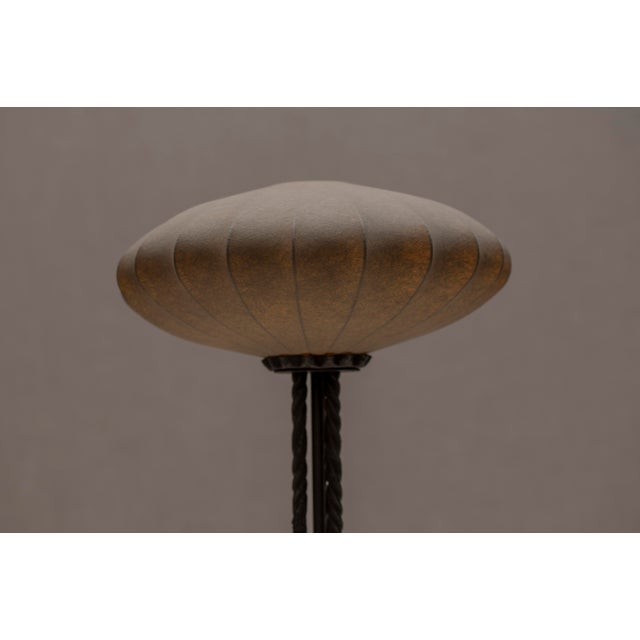 Striking French mid century floor lamp from the brutalist period, dating circa 1960s–1970s. This sculptural piece features...