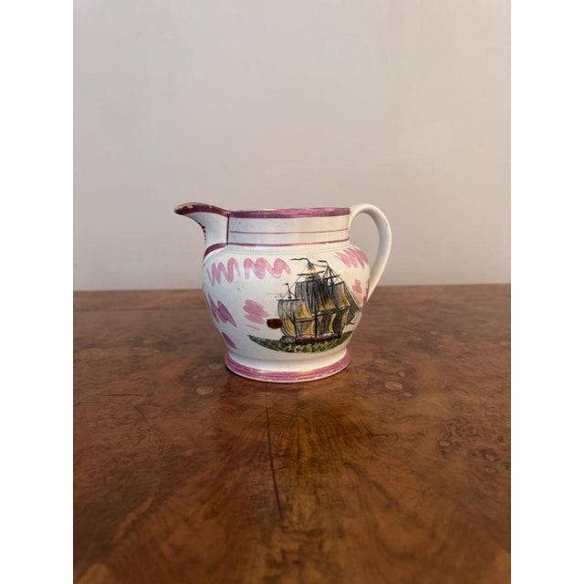 Quality antique Victorian Sunderland lustre jug, having a quality antique Victorian Sunderland jug decorated with a large...