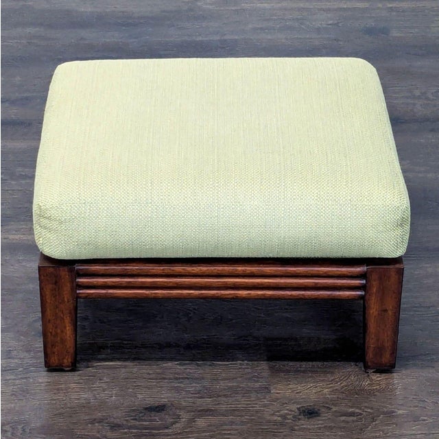 Upholstered ottoman on a wood base. Brand: Ethan Allen. Dimensions (in): 26W x 21D x 16H.