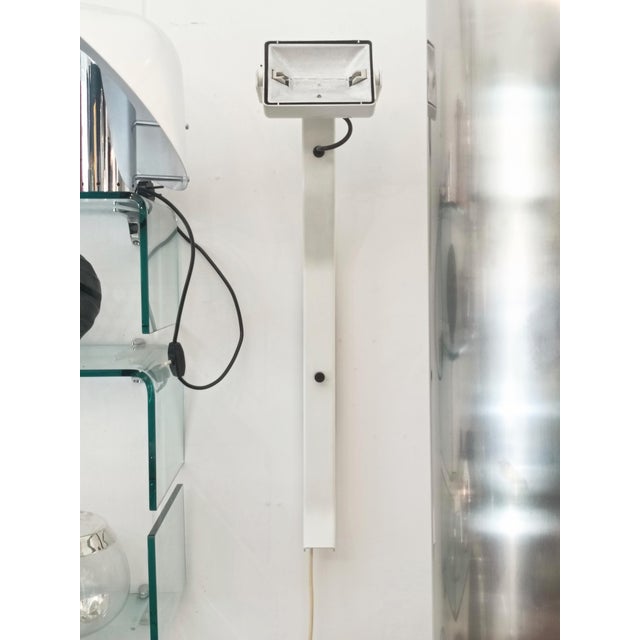 Iconic Sirio wall lamp, designed by Japanese designer Kazuhide Takahama and produced by the renowned Italian manufacturer...