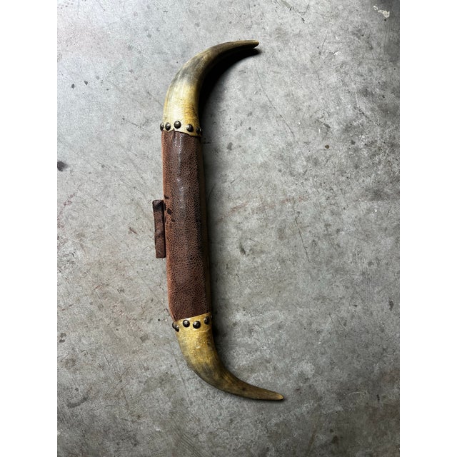 Up for consideration is a beautiful vintage horn and leather wall hanging with studded details. This would look lovely in...