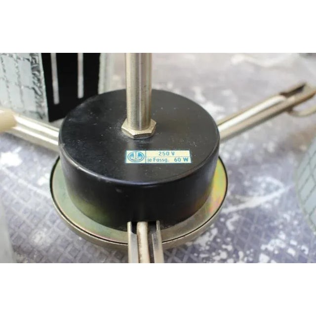 Manufactured in the 1970s, in Germany. Made of glass, chrome and lacquered metal. Re-polished, cleaned, a few signs of...