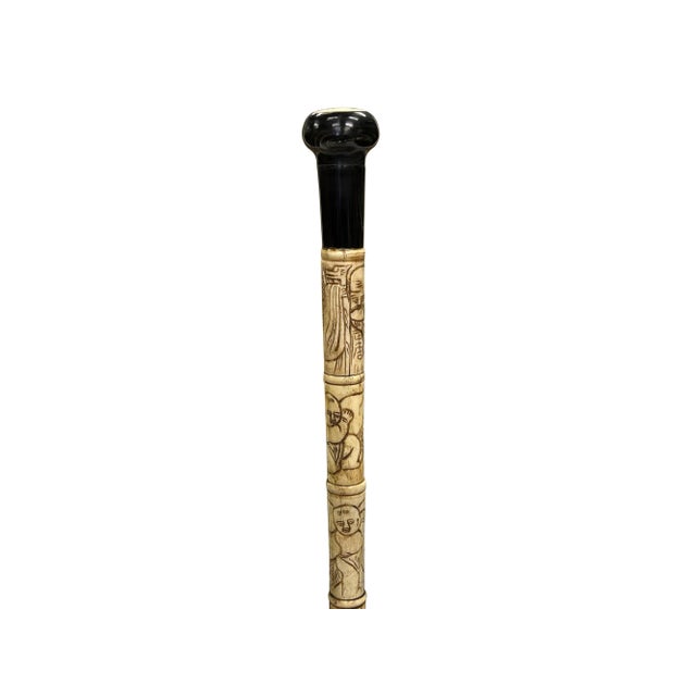 Imagine a walking stick of singular craftsmanship, crafted by hand with intricate detail and care. This walking stick...