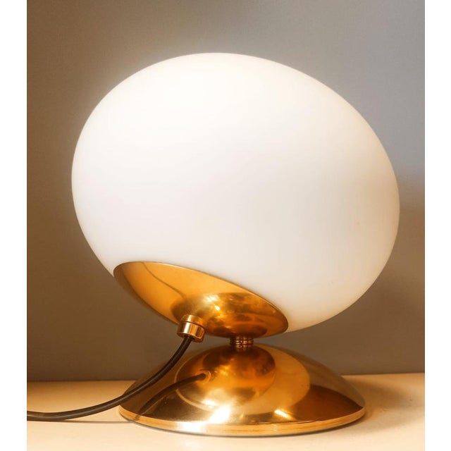 Brass Light with Oval Glass, in Very Good conditions. Designed 1970 to 1979 European Plug (up to 250V).The wiring of this...