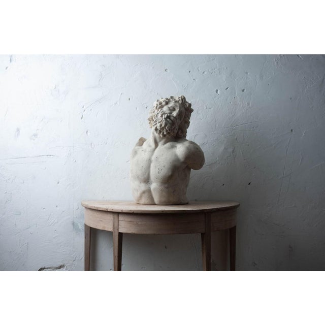 A cast bust of Laocoön after the Hellenistic marble group in the Vatican Museums, taken from the central figure of the...