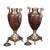 A fabulous pair of Roman style brass footed and fitted urns. The urns are nicely finished and boast a footed base, figural...
