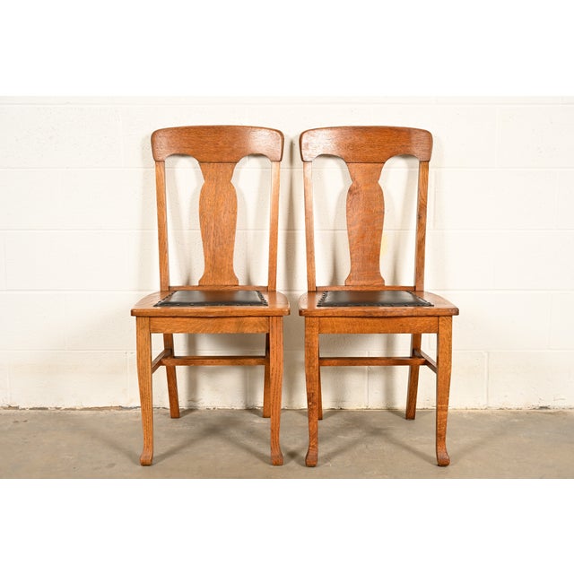 A beautiful pair of antique Mission or Arts & Crafts period side chairs or dining chairs By Heywood Wakefield USA, Circa...