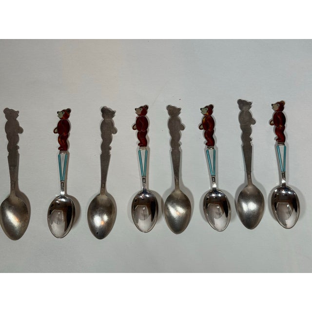 A wonderfully charming and highly collectible set of eight vintage Soviet Estonian silver and enamel bear spoons, produced...