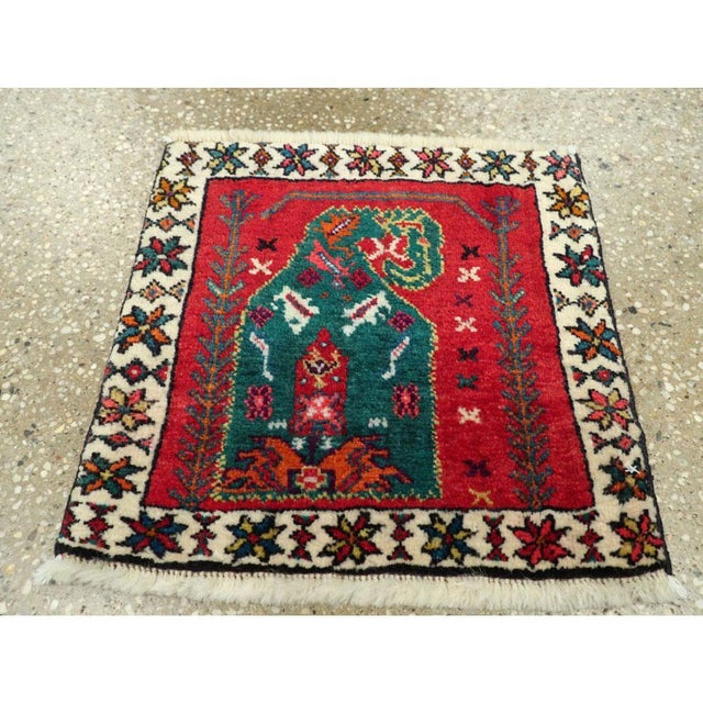 A vintage Persian Shiraz square throw rug handmade during the mid-20th century. Measures: 1' 2" x 1' 2" Persian rugs &...