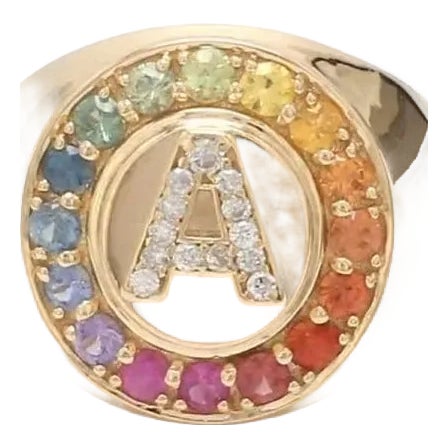 Natural 0.83cts rainbow sapphire & 0.08 cts diamond ring in 18k gold For Sale