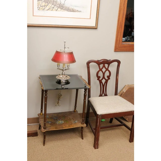 This is a beautiful example of an early 20th century French buillotte lamp. The original handsome red painted finish is...