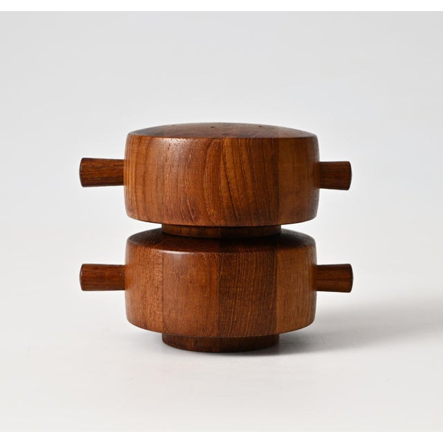 Danish modern pepper mill with salt shaker. Designed by Jens Harald Quistgaard for Dansk Designs. Made of teak wood with...