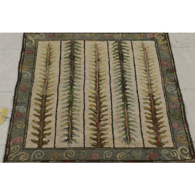 Handmade in wool and originating circa 1920-1930, this 2x3 rug is a rare and exciting new curation in Rug & Kilim’s...