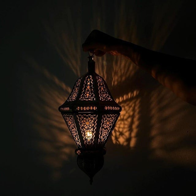 Bring warmth and authentic Moroccan charm into your space with this handcrafted brass lantern, meticulously made by...