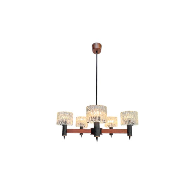 Swedish mid-century chandelier in the style of Carl Fagerlund for Orrefors, 1960s. A beautifully architecturally designed...