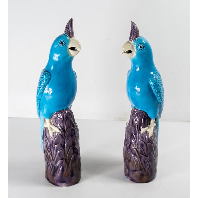 We are selling this pretty decorative pair of Chinese Parrots. These parrots have vibrant electric Turquoise Blue glazed...