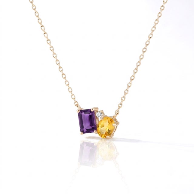 Radiant Gems of Joy: Amethyst & Citrine cluster Necklace with a Touch of Diamond Sparkle Celebrate life’s vibrant moments...