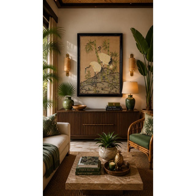 A beautiful vintage Japanese painted silk artwork depicting a serene pair of red-crowned cranes gracefully wandering...