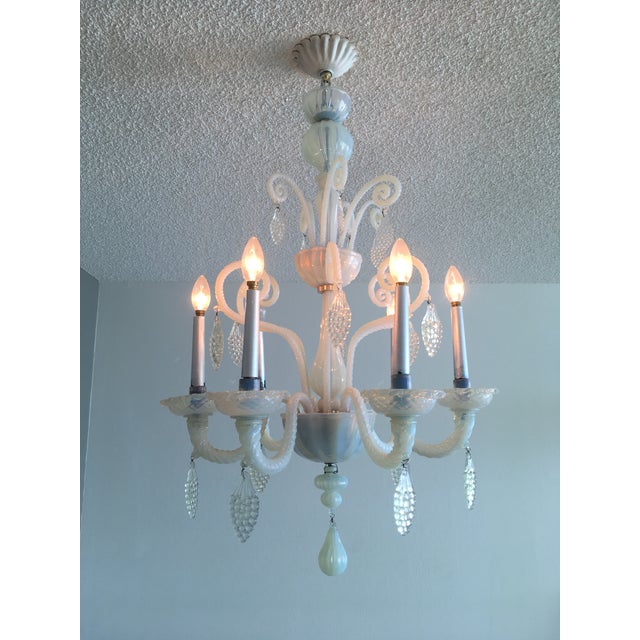 Unusual traditional Murano glass five arm chandelier. The glass is opalescent and ranges in different tones of bluish...