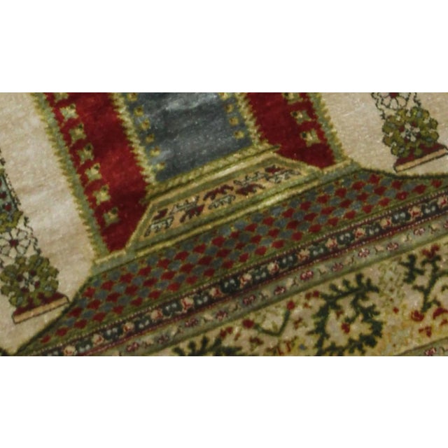 Hand knotted of top quality vegetable dyed silk in 1900's. This extremely fine rug is easy to clean and maintain, making...
