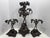 Stunning, highly detailed 3-piece silver-plated candelabra table garniture set from the late Victorian era. Executed...