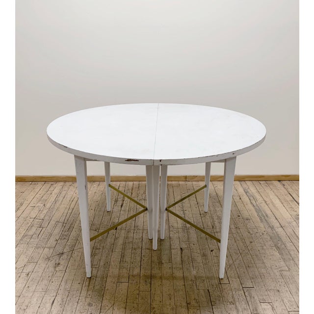 Paul McCobb Directional Dining Table with Brass Stretchers One of the more desirable dining table forms with brass...