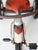 1950s Midwest Industries children's tricycle in a classic red, white, and blue color palette. The streamlined steel frame,...