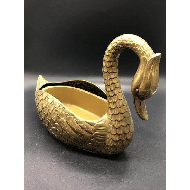 This charming vintage brass swan is not only a decorative work of art but also a practical humidifier. Equipped with a...