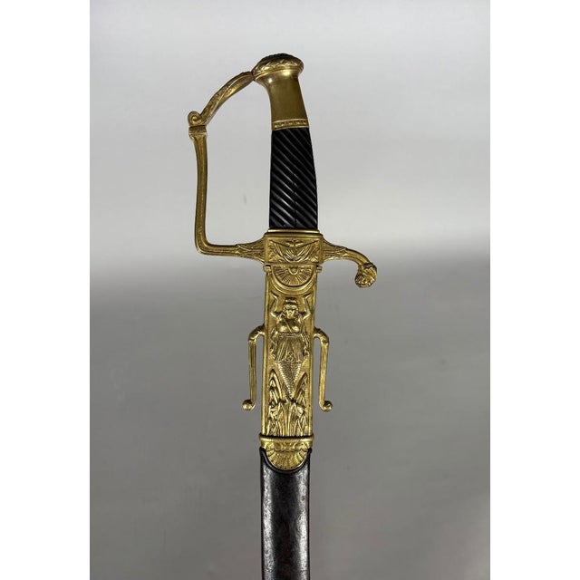 Naval officer's saber, Prairial model, Year XII Empire, 19th century. Oval pommel decorated with a vegetal wreath, knuckle...